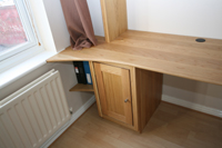 Detail, Curved Worktop merging into window sill. Office/Study. American Oak, American Black Walnut beading. Enlargement 8. (0.5 mb)